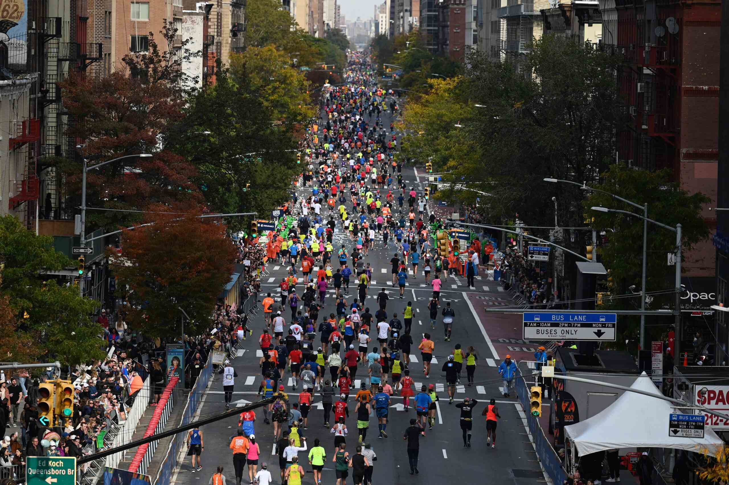 NEW YORK, NY – NOVEMBER 7: The 2021 TCS New York City Marathon is held on November 7, 2021. The course goes through all five boroughs of New York City, starting in Staten Island and ending in Central Park. This year marks the 50th running of the marathon. The scene on the Queensboro Bridge and 1st Avenue. (Photo by Jon Simon for NYRR)